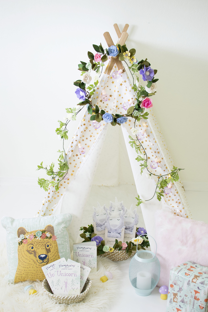 Tent, Unicorn Plush, Invitations, Bear Pillow from Unicorn Woodland Party In Collaboration with Slumberkins and Styled by Twinkle Twinkle Little Party | Black Twine